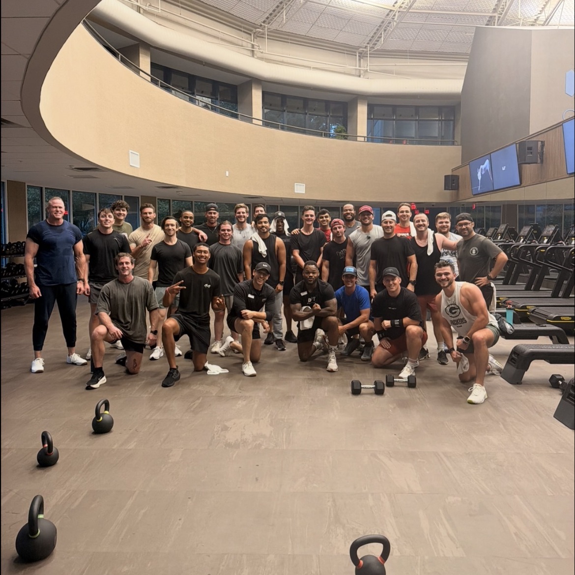 Men gathered together after an Iron Sharpens Iron workout in Atlanta