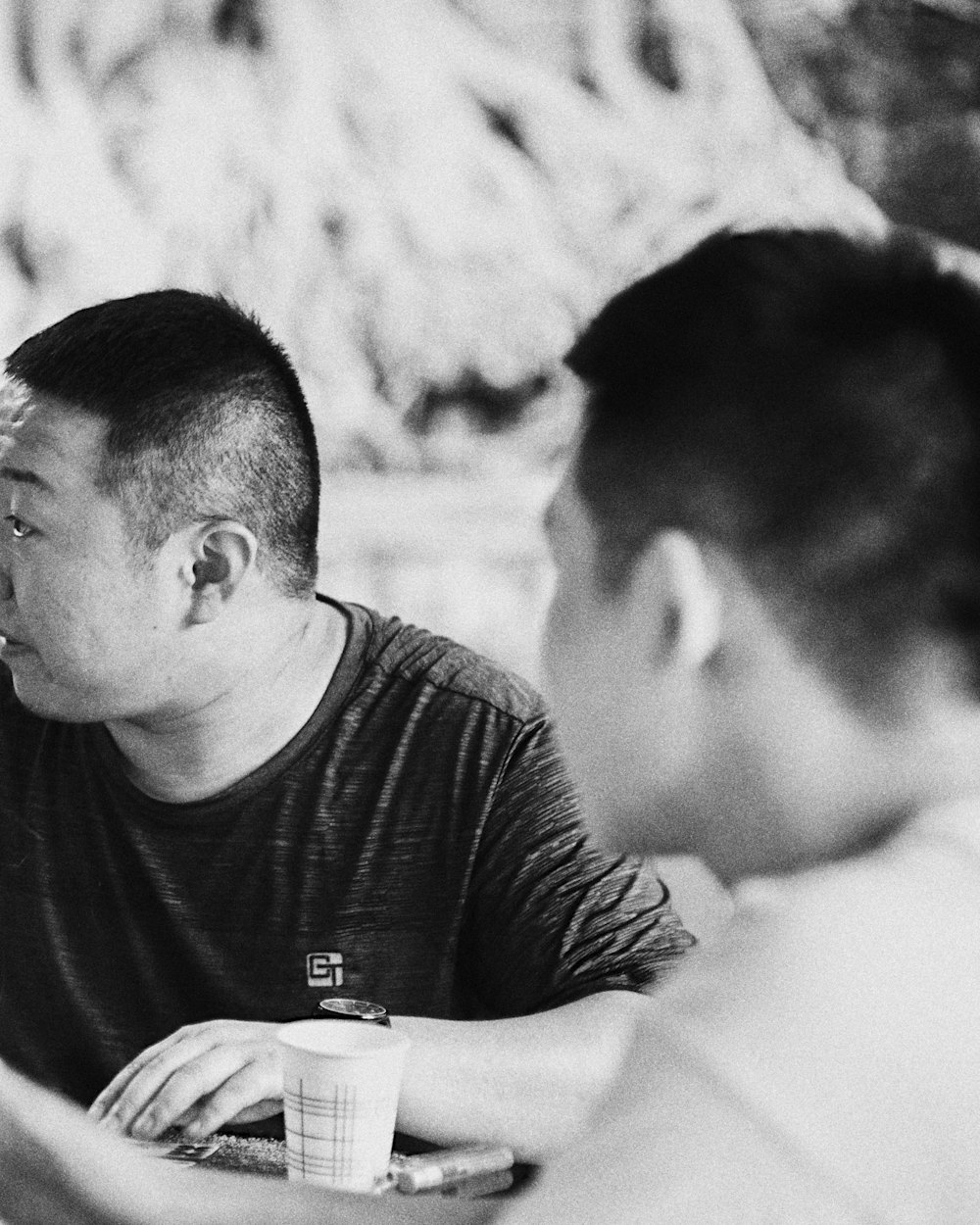 Two men in close conversation